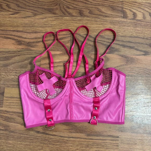 Tops - pink PVC leather bra top with a cross motif